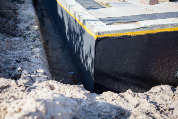 Professional Wet Basement Repair technician working in Brookville, OH
